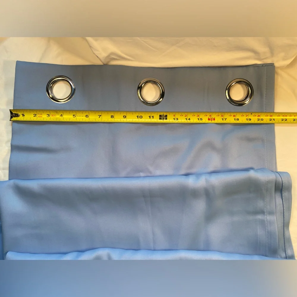 Curtain single panel, light blue, silver tone grommets. 42” x‎ 82”